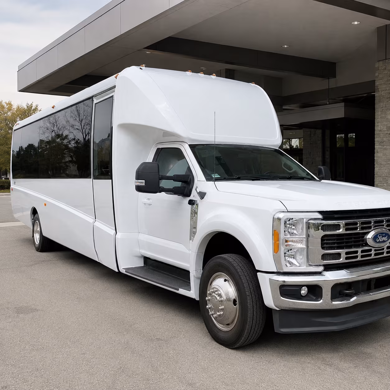 corporate airport transfer buses between springdale and xna